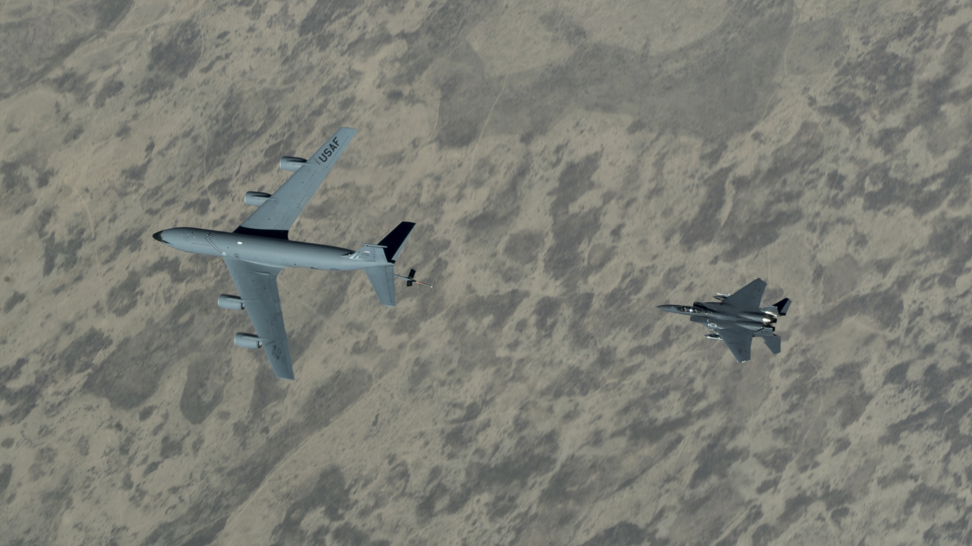 A U.S. Air Force F-15E Strike Eagle approaches a KC-135 Stratotanker over the U.S. Central Command area of responsibility on June 12, 2020.